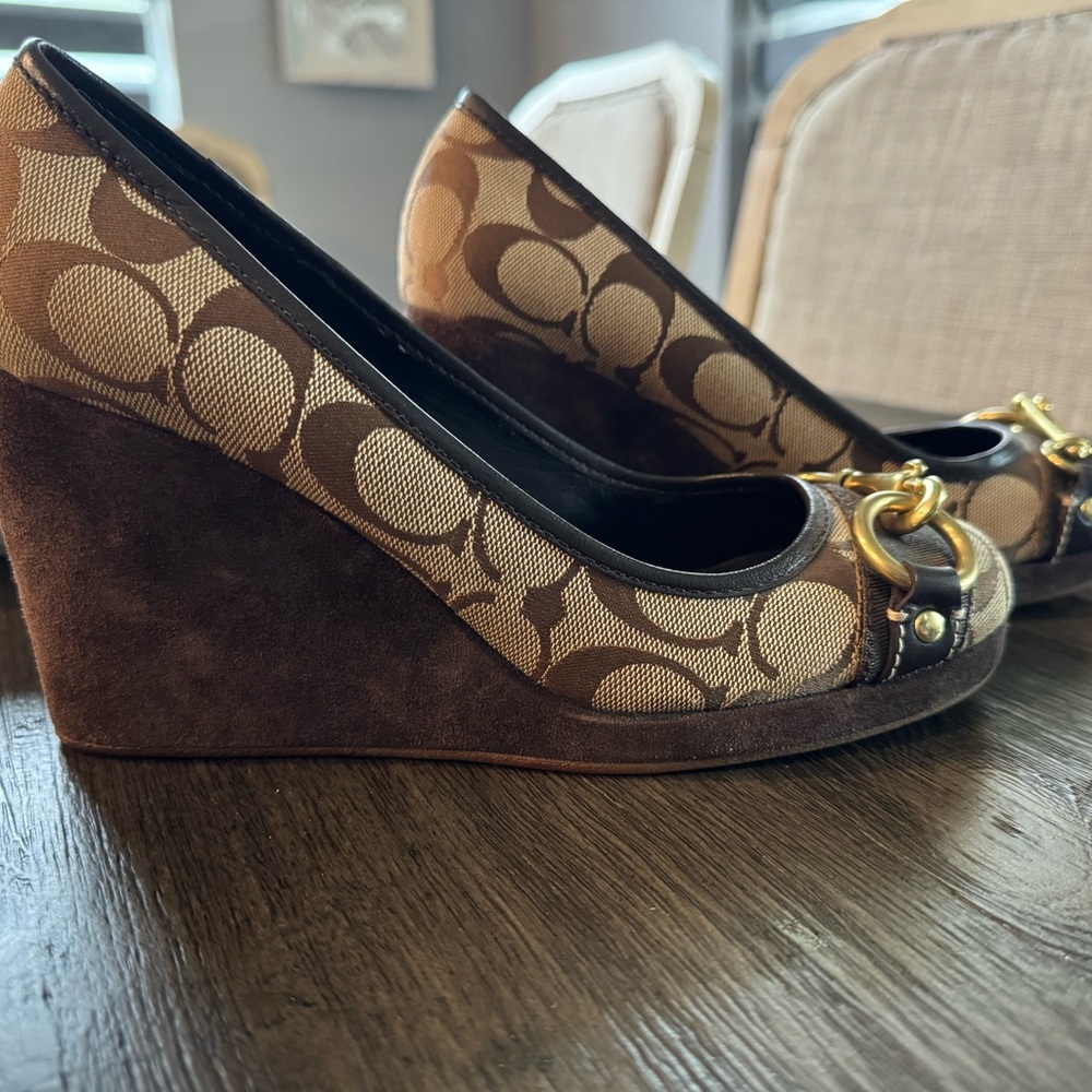 Coach wedge shoes in neat condition. Only wore once!